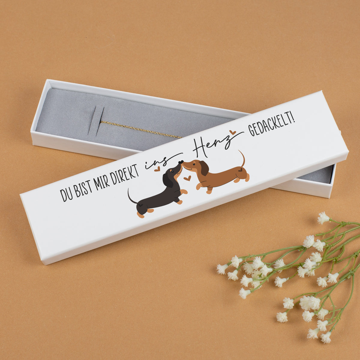 Schmuckverpackung mit Dackel-Motiv & Spruch 'Du bist mir direkt ins Herz gedackelt!' für Paare
