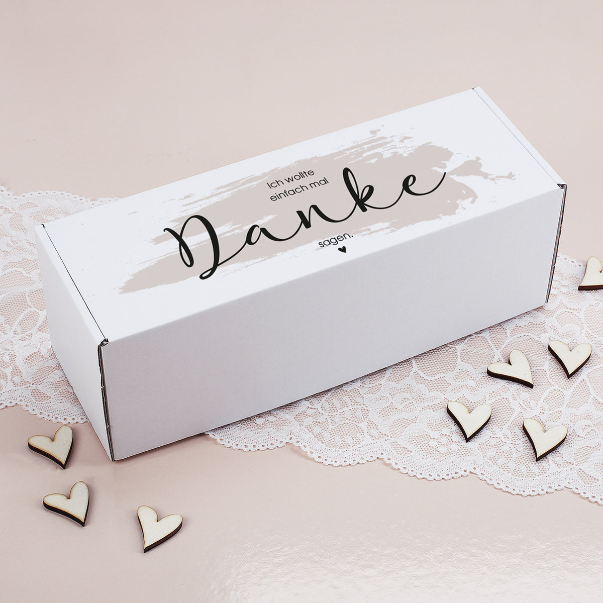 Geschenkverpackung mit Aufdruck „Ich wollte einfach mal Danke sagen“ auf dem Deckel, rechteckig und geschlossen dargestellt.