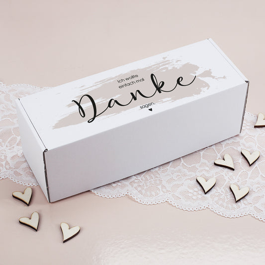 Geschenkverpackung mit Aufdruck „Ich wollte einfach mal Danke sagen“ auf dem Deckel, rechteckig und geschlossen dargestellt.