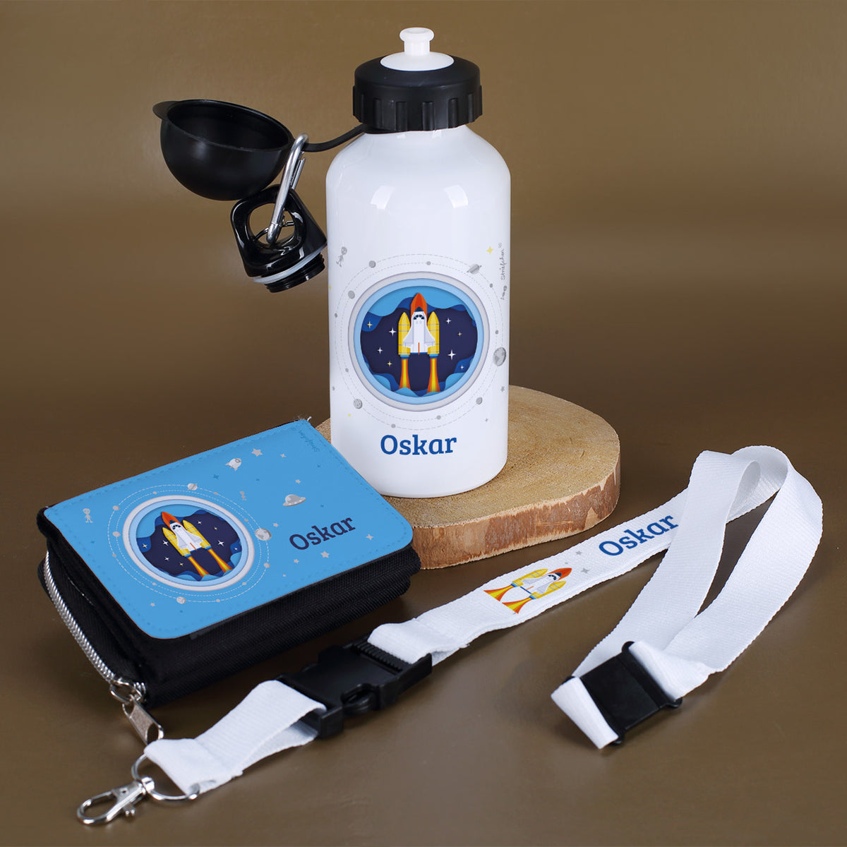 Trinkflasche, Geldbörse, Schlüsselband zur Einschulung mit Raumschiff-Motiv und Name