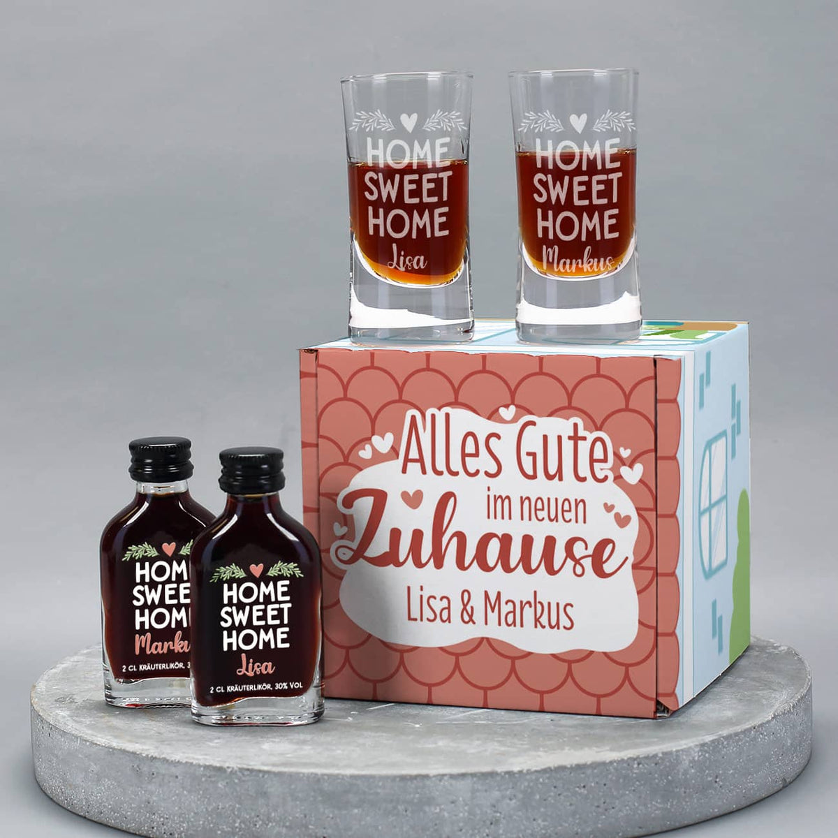 Kleines Geschenkset mit Schnapsgläsern, Kräuterlikör und Präsentverpackung als kleines Haus