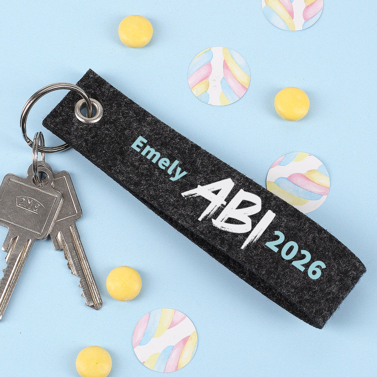 ABI - Schlüsselanhänger mit Name Emely - blauer Hintergrund
