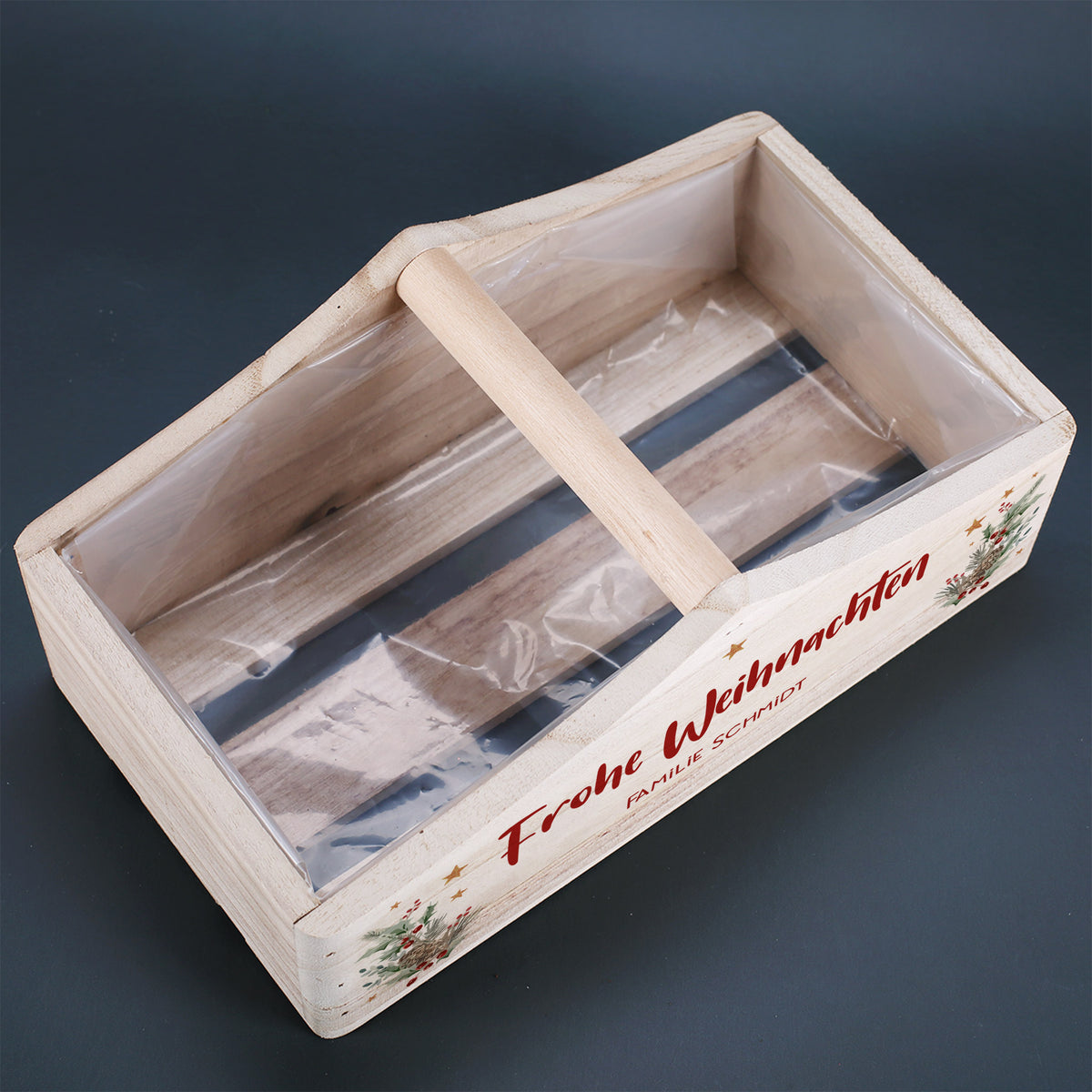 Innenansicht des Holzkorbs mit Mittelgriff und transparenter Folie, geeignet zum Befüllen oder Bepflanzen.