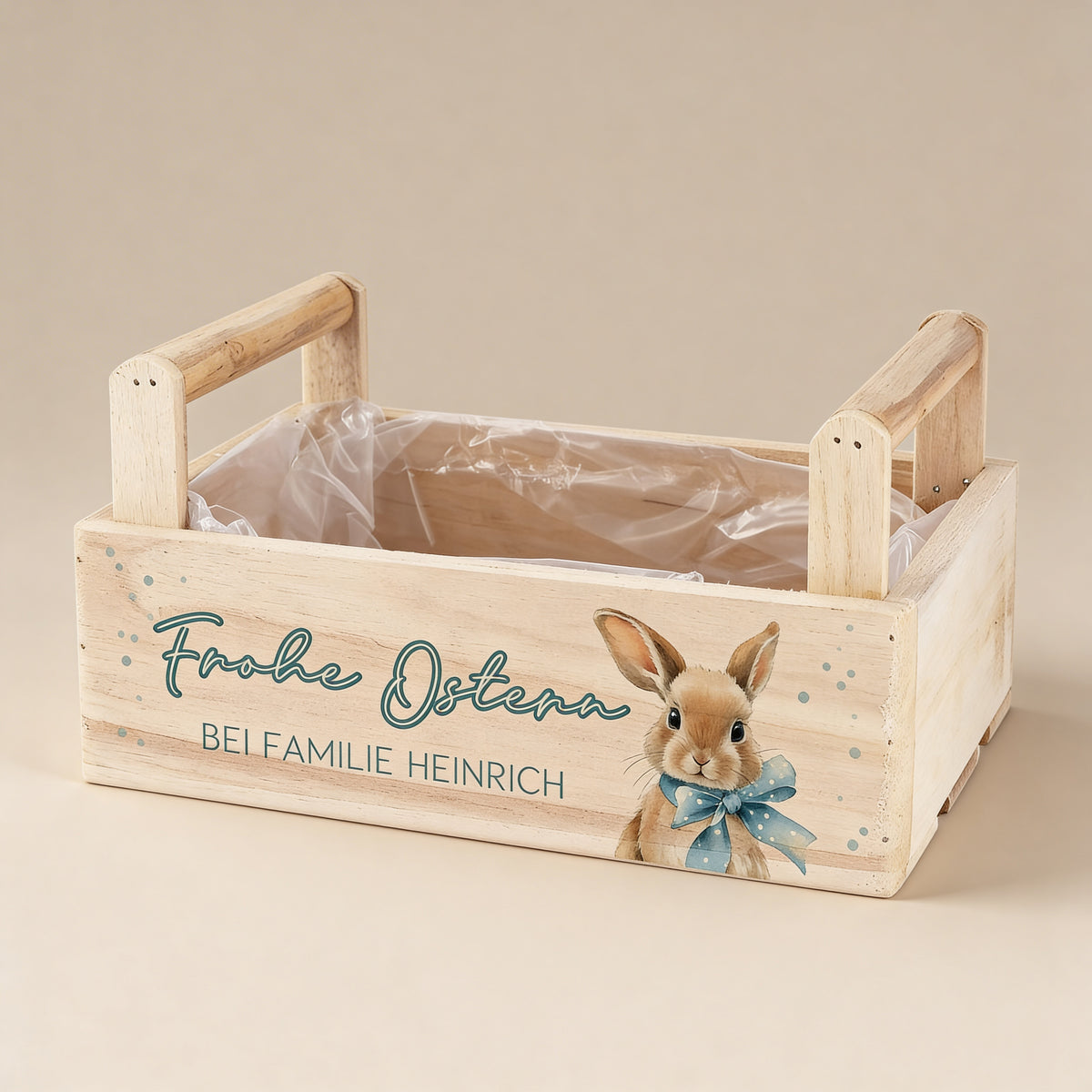 Personalisierte Oster Holzkiste mit Mittelgriff, Hasenmotiv und Schriftzug „Frohe Ostern“ mit individuellem Wunschtext