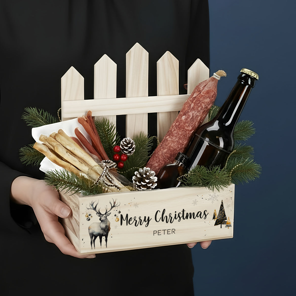 Geschenkkiste mit Zaun und Wunschtext zu Weihnachten