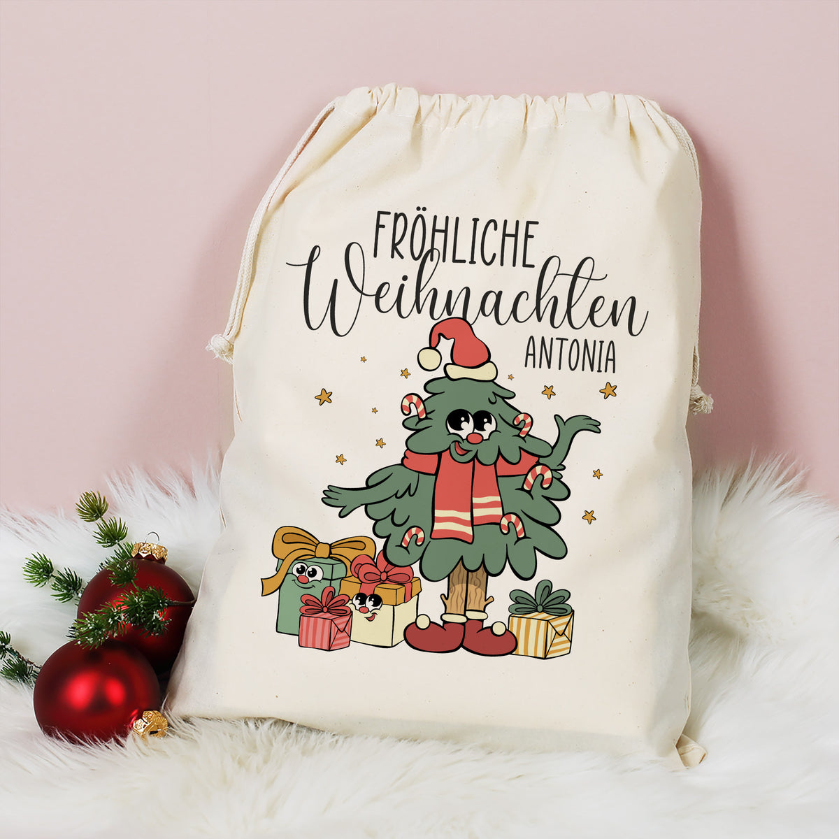Großer Geschenksack mit Weihnachtsbaum Motiv, Name Antonia und Schriftzug Fröhliche Weihnachten