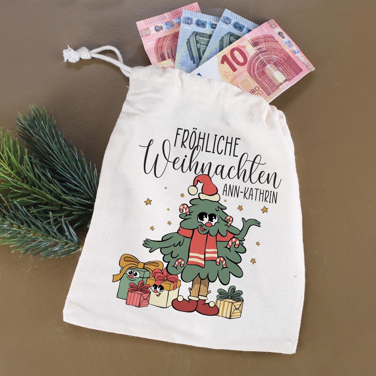 Kleiner Weihnachts Geschenksack mit Name Ann-Kathrin und Geldscheinen
