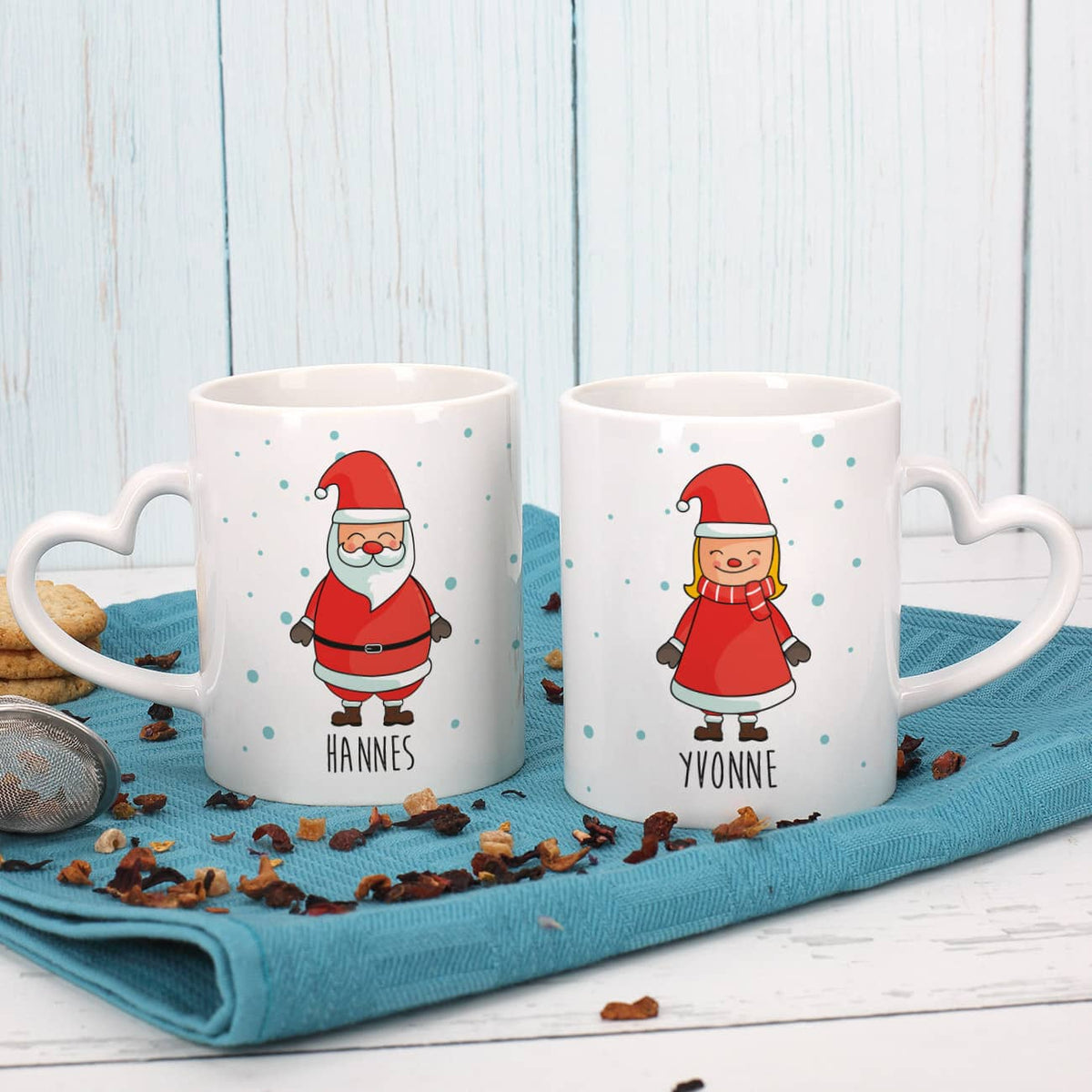 Paartassen mit Herzhenkel und Weihnachtsmotiv