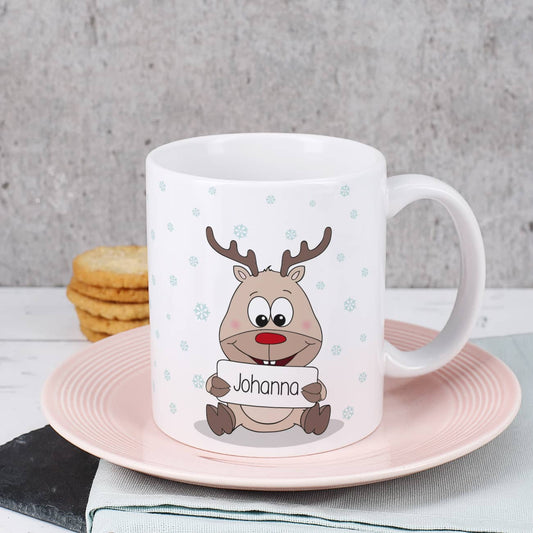 Tasse mit niedlichem Rentier und Ihrem Namen