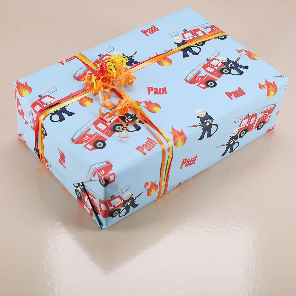 Geschenkpapier für kleine Feuerwehrmänner mit Wunschname