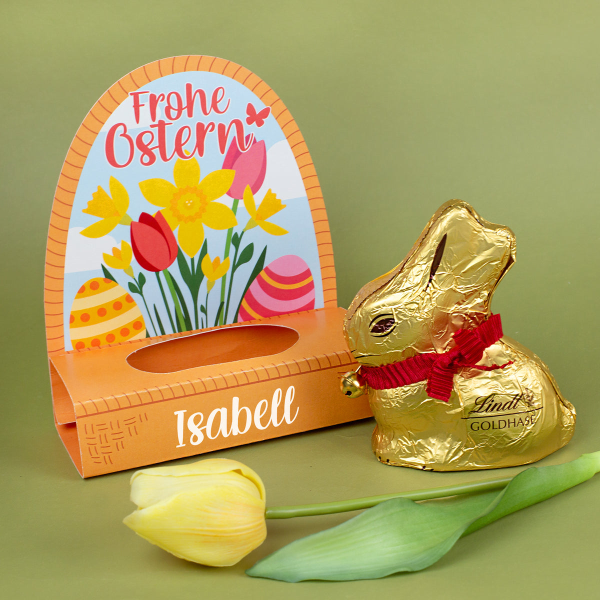 Personalisierter Lindt Goldhase in Osterverpackung mit Name Isabell und Frühlingsmotiv