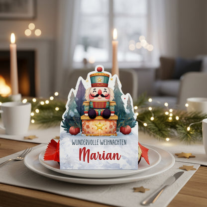 Mini-Stollen in personalisierter Nussknacker-Verpackung als Namensschild zur Weihnachtsfeier