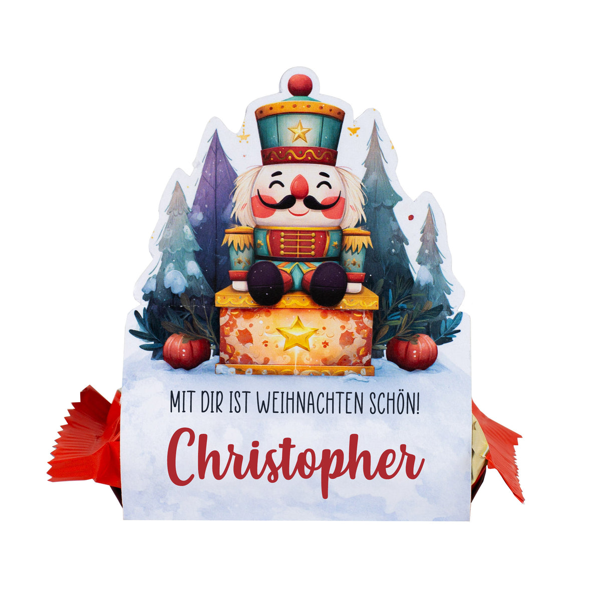 Freigestellte Nussknacker-Geschenkverpackung mit personalisiertem Namen „Christopher“ und sichtbarem Mini-Stollen