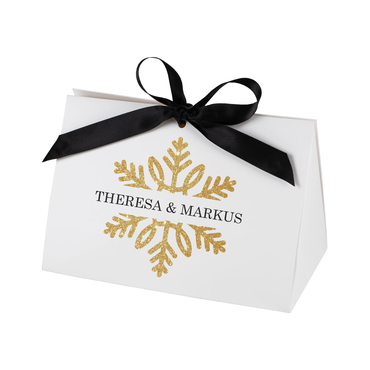 Freigestellte Geschenktasche mit goldfarbener Schneeflocke und personalisiertem Text „Theresa & Markus“, vor weißem Hintergrund.