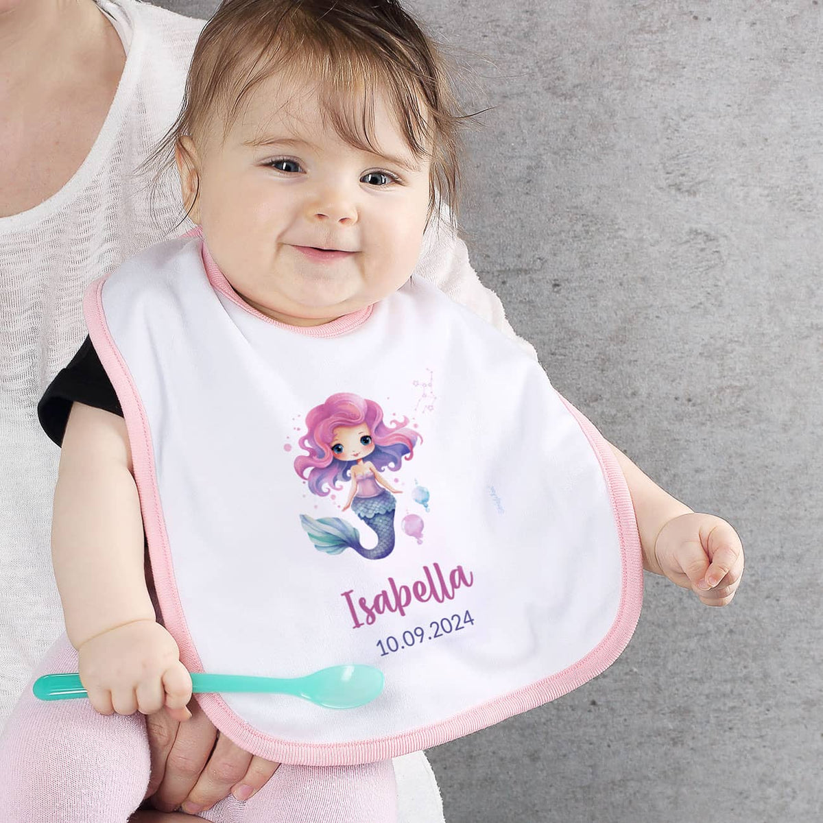 Weiß/rosa Lätzchen mit Sternzeichen, Name und Datum