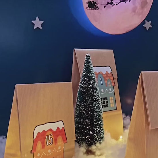 DIY Adventskalender Kraftpapier Tüten mit weihnachtlichen Weihnachtsdorf Motiv